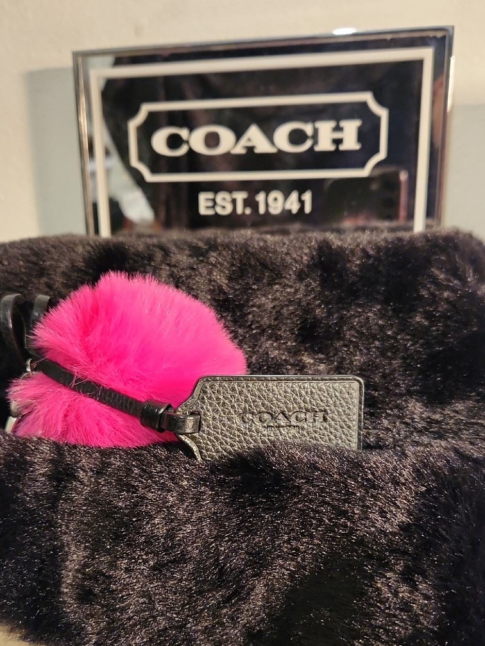 Coach Black Hang Tag With Pink Pom Pom Keychain